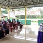 Polsek Padang Jaya Hadiri Musyawarah Desa Tambak Rejo